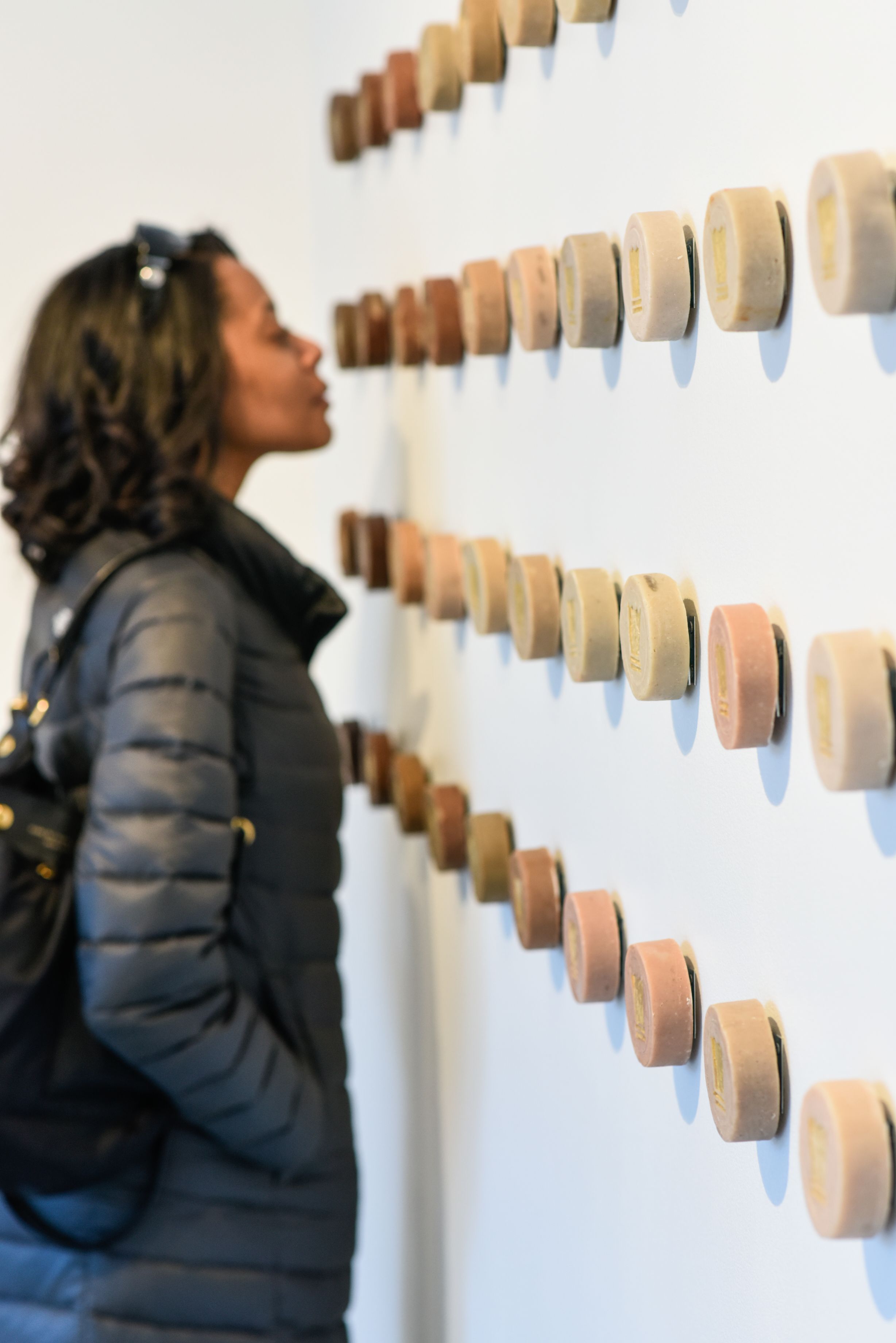 women looking at circle art